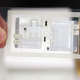 A printed circuit with two flat batteries.
